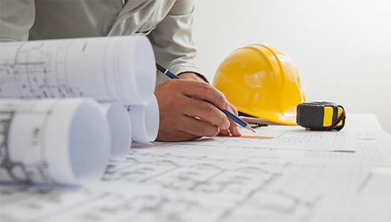 Construction Worker Designing a Building