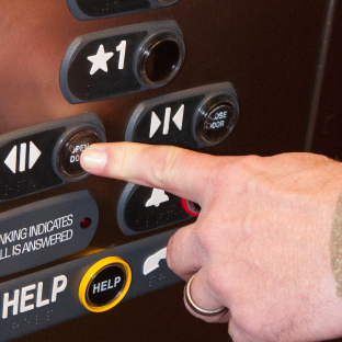 pressing elevator button